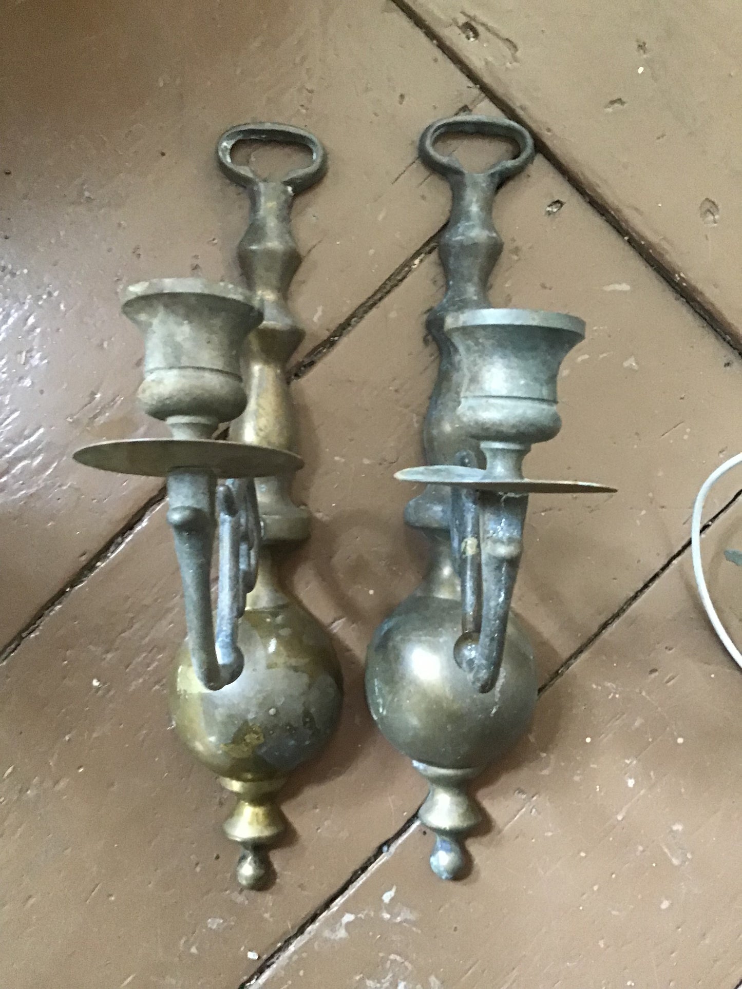 Set of brass wall sconces for candles