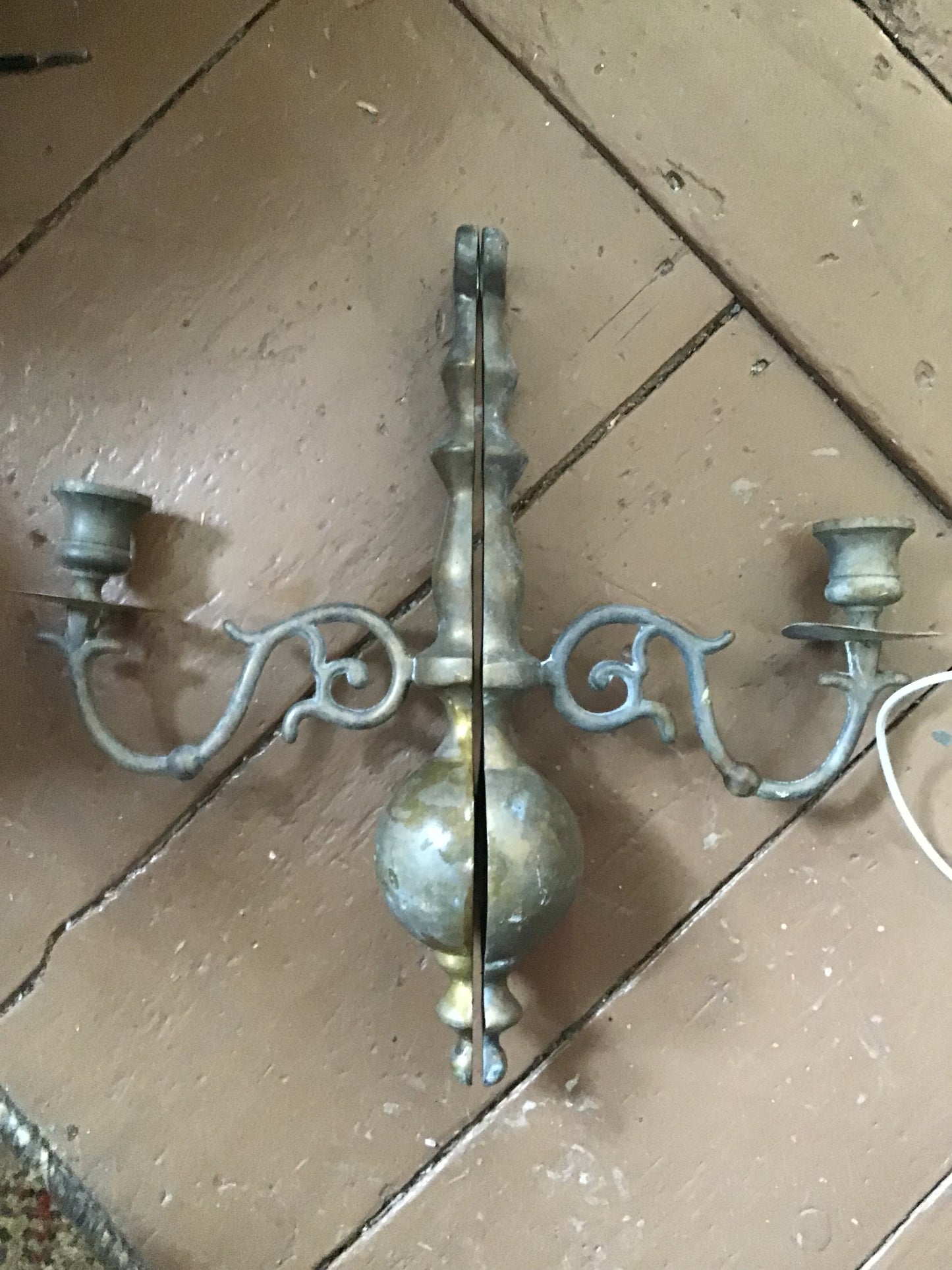 Set of brass wall sconces for candles